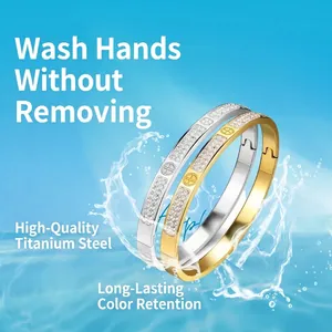 Titanium steel bangles with zircon diamonds and screw patterns in water background