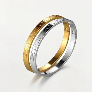 Polished stainless steel bracelets with Greek Meander pattern in gold and silver