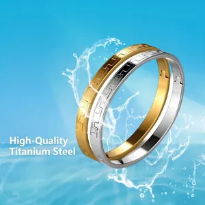 Titanium steel couple bracelets with Greek meander pattern in gold and silver finish