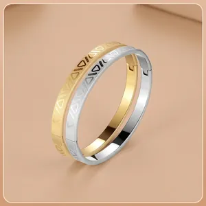 Polished stainless steel bracelets set in gold and silver with hollow triangle pattern