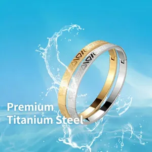 Polished titanium steel bangles for men in gold and silver with geometric patterns
