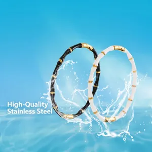 Bamboo-style titanium steel bracelets with black and white drip oil on blue water