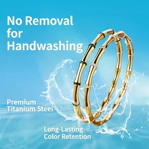Bamboo style stainless steel bracelets with stones against water splash background
