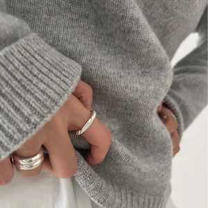Minimalist 925 sterling silver knotted twist open ring set on a model hand