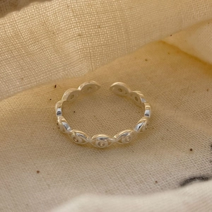 Adjustable 925 sterling silver open ring featuring sparkling evil eye charm details