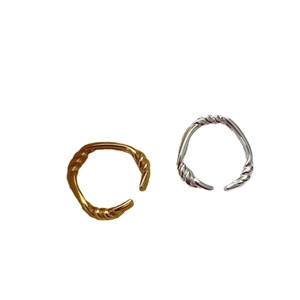 Twisted knot open ring set in gold and silver finish with minimalist braided texture