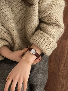 Chic 925 silver beaded open rings paired with a vintage gold watch and leather strap