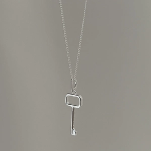 Minimalist 925 sterling silver key pendant necklace with a sleek rectangle hollow design
