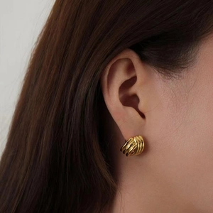 Élégantes boucles d'oreilles créoles torsadées en argent 925 doré pour femmes