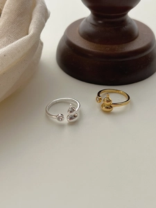 Detailed shot of S925 sterling silver gourd rings with sparkling zircon accents