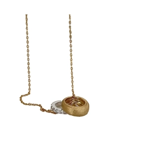 Minimalist silver and gold interlocking ring pendant necklace with brushed and pavé detail