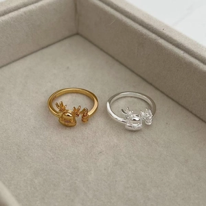 Silver and gold S925 sterling silver elk antler open rings with festive bells on a tray