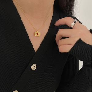925 silver gold necklace featuring a rectangular sunburst pendant with a red stone eye