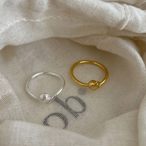 Minimalist 925 silver rose flower knot rings in gold and silver finish on fabric pouch