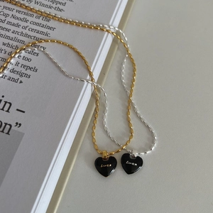 Minimalist S925 sterling silver heart necklaces with black Luck and Love enamel pendants