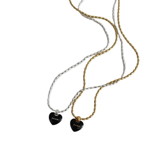 Luck heart charm necklaces in gold and silver finish with black enamel heart pendant