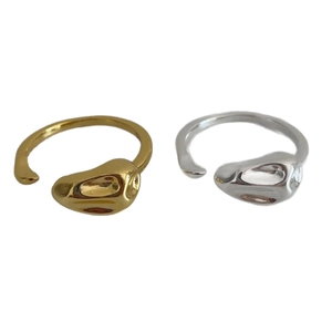 Irregular molten silver and gold open rings with a modern minimalist geometric design