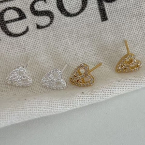 Sparkling 925 sterling silver heart stud earrings set with pavé cubic zirconia