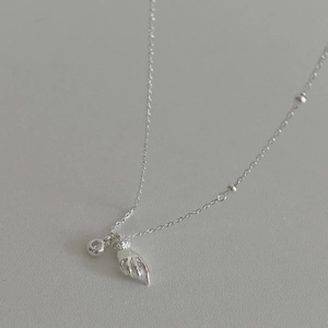 925 sterling silver magnetic necklace featuring a hand pendant and clear round diamond charm