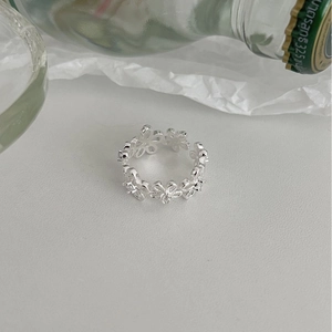 Elegant 925 sterling silver open ring featuring a hollow floral pattern with five-petal blossoms