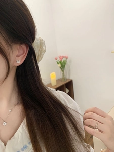 Elegant 925 sterling silver butterfly earrings and jewelry set on a female model