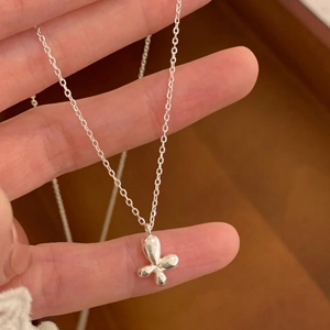 Minimalist S925 silver necklace featuring a polished 3D butterfly pendant on thin chain