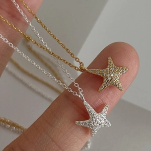 925 silver starfish necklace with sparkling micro-pave crystals in gold and silver finish