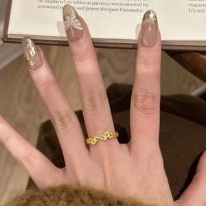 Vintage gold adjustable floral ring with zircons on an open silver band for women
