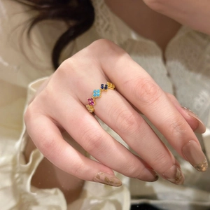 Colorful S925 sterling silver four-leaf clover ring with vibrant rainbow enamel petals