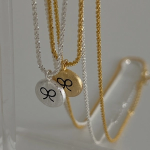 Minimalist silver and gold chain necklaces with brushed round bow pendant for women