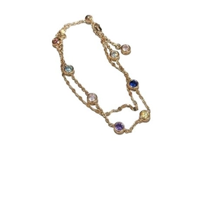 Bracelet double rang en or orné de pierres de zircone colorées de style station