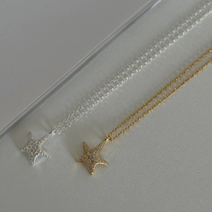 Elegant 925 sterling silver starfish necklace with sparkling crystals in gold and silver