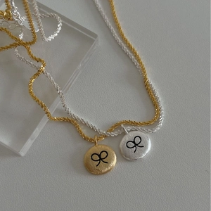 Minimalist brushed round bow pendant necklace set in gold and silver finish