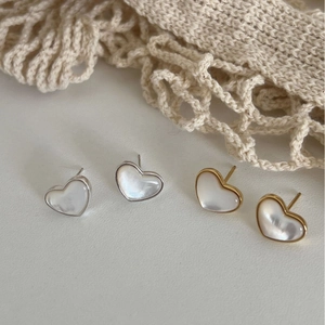 Elegant heart-shaped mother of pearl stud earrings in gold and silver metal frames