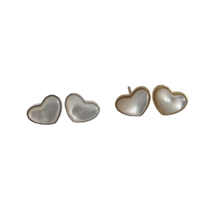 Minimalist heart-shaped mother of pearl stud earrings in gold and silver finish