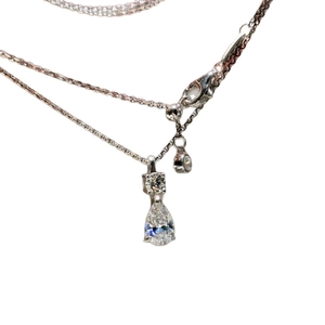 Minimalist silver teardrop pendant necklace for women with pear-cut crystal on a fine chain