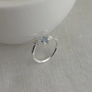 Adjustable S925 silver ring featuring blue star gemstone and textured finish