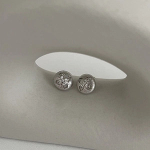 S925 sterling silver four-leaf clover stud earrings with matte brushed finish and zircons