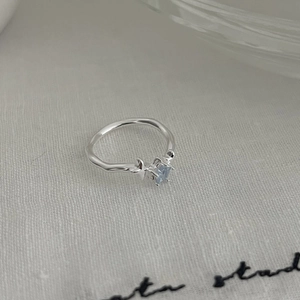 Minimalist S925 silver open star ring with light blue gemstone and lava texture