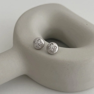 Minimalist S925 sterling silver four-leaf clover stud earrings with brushed metal finish