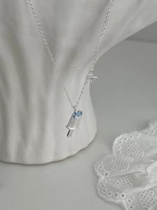 Detailed view of S925 silver popsicle pendant with blue crystals and brushed finish