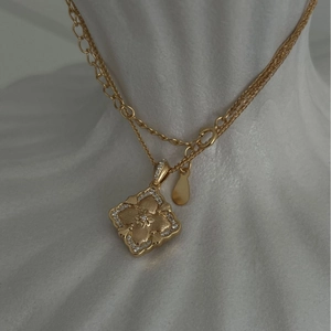 Vintage brushed gold double-layer necklace with floral rhombus pendant and crystal accents