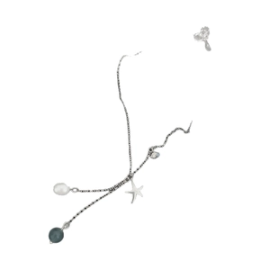 Ocean-themed silver necklace with starfish, shell charms and elegant pearl tassel