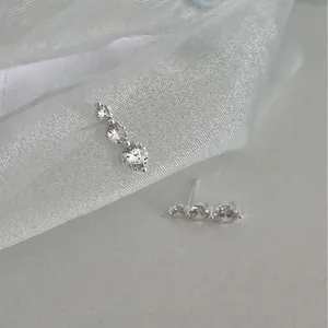 Elegant S925 silver stud earrings with three graduated clear cubic zirconia stones