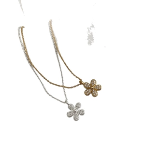 925 silver flower necklace with zircon stones in gold and silver finish on white background
