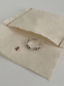 Detailed macro view of retro S925 sterling silver pig nose anchor link open ring