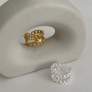 Double-layered chain heart ring in gold and silver finish with polished mirror texture