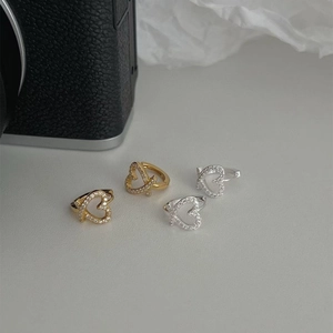 Minimalist S925 silver heart stud earrings with cubic zirconia in gold and silver finish