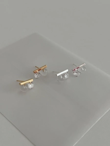 Detailed view of minimalist geometric S925 silver stud earrings with clear crystals