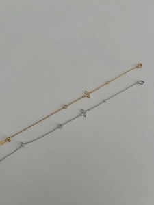 Detail view of S925 silver four-leaf clover bracelets with zircons and S925 hallmark stamp